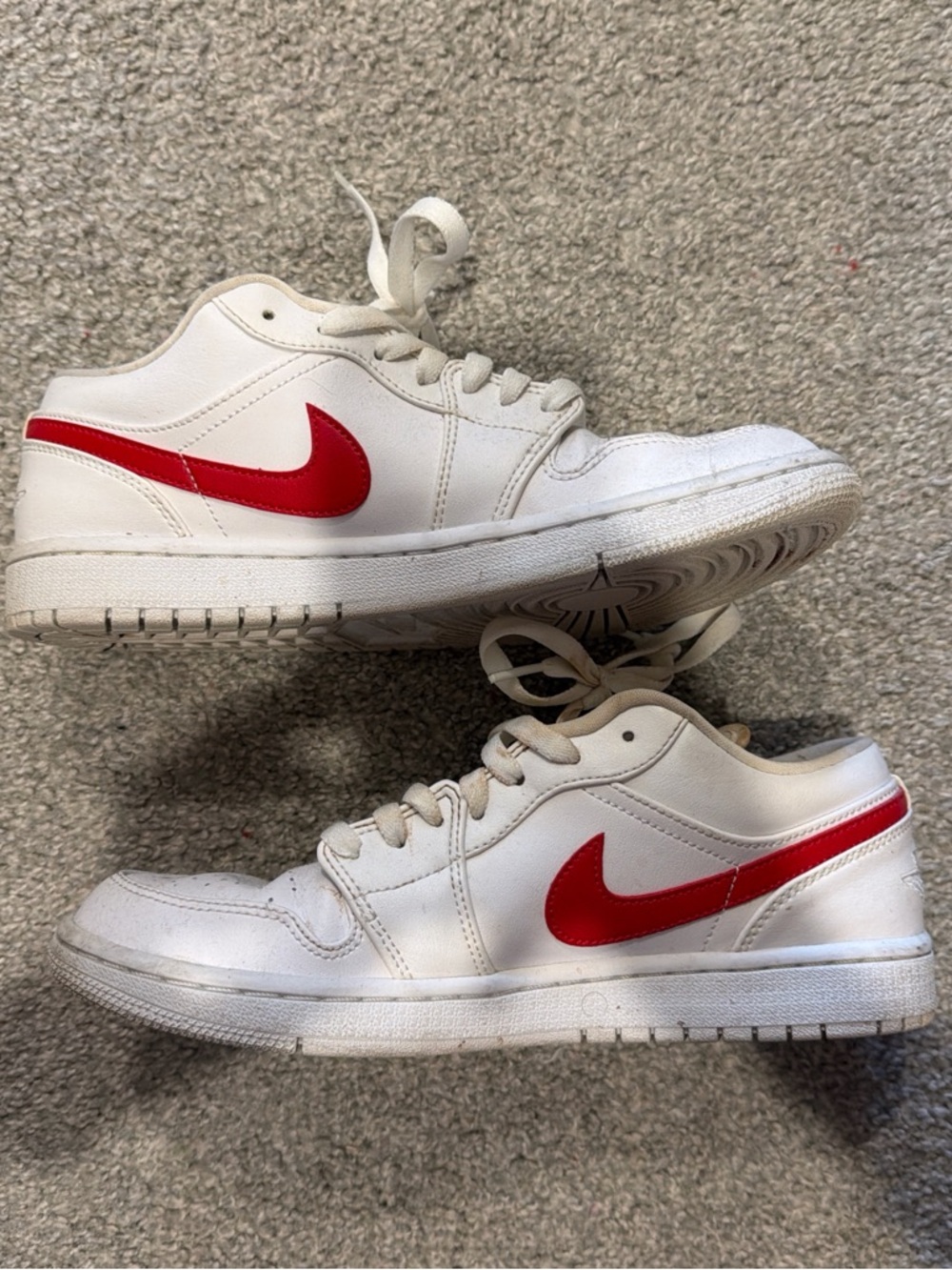 Nike White Low-Top Sneakers with Red Swoosh Accents